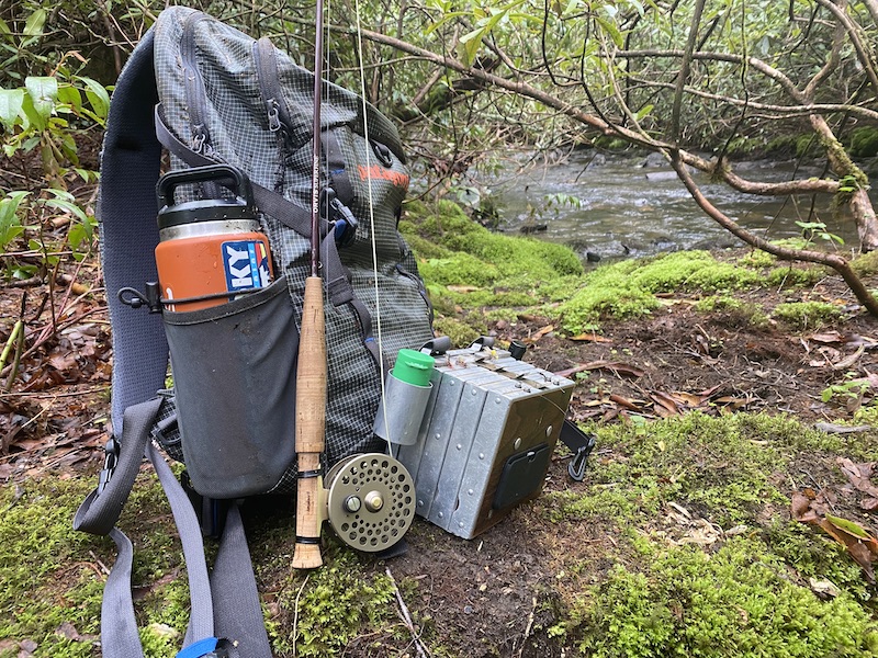 Orvis Superfine fly rod, Patagonia pack and Richardson chest fly box